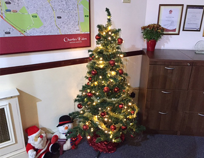 Christmas tree decorated in a office 