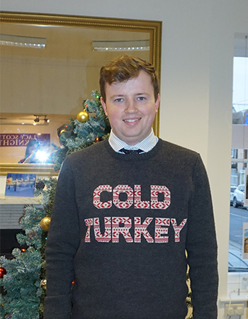 Man wearing a jumper with Cold turkey on the front 