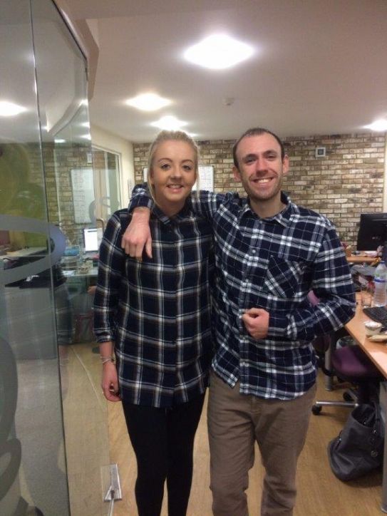 matching shirts in the office happy peopel