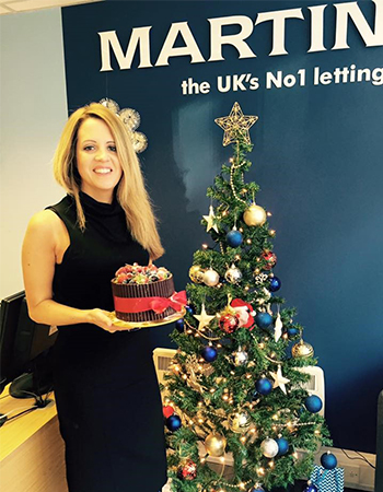 Martin number 1 letting agency woman with cake