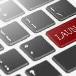 New property listings announcement on real estate website keyboard key. "LAUNCH" Red button keyboard on laptop